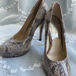 Michael Kors snakeskin 4 1/2” heel.  Good condition.  Size 6M.